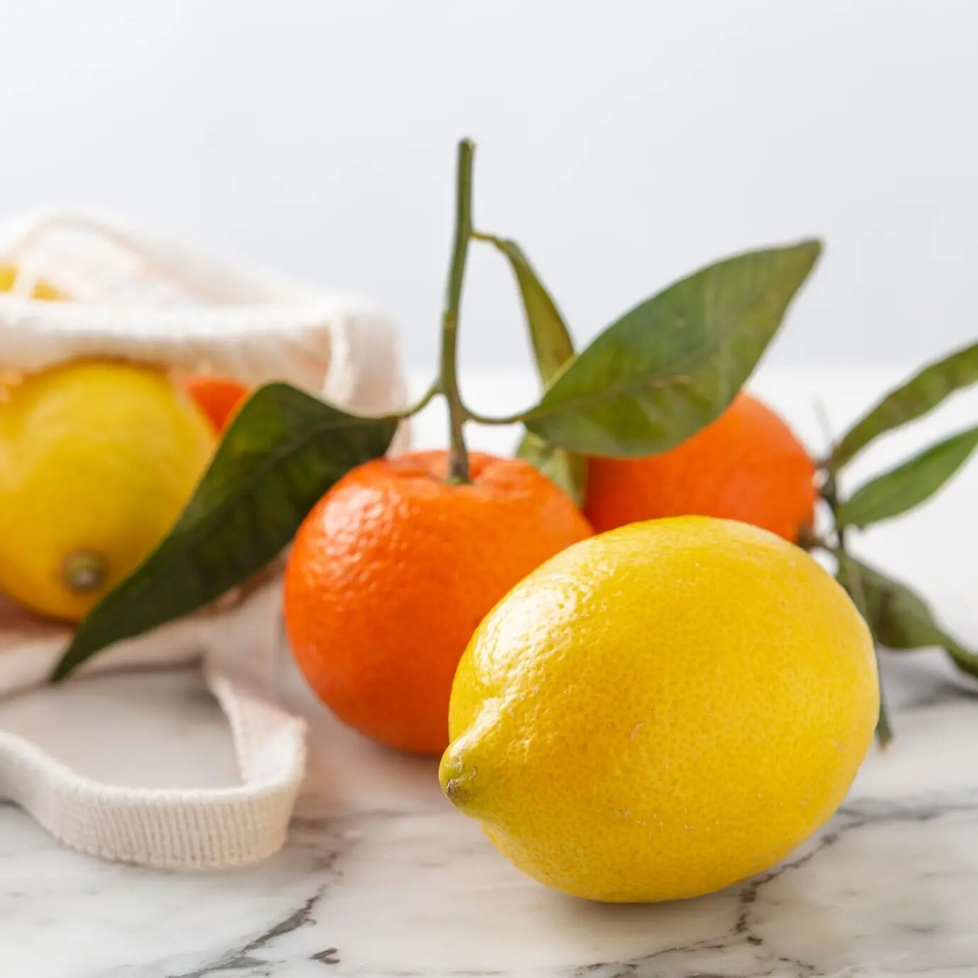Lemons and mandarins on a table